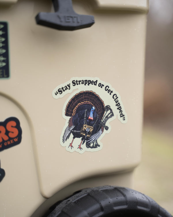 "Stay Strapped Get Clapped" Sticker
